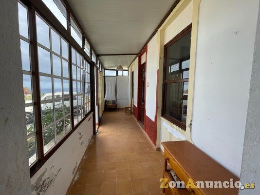 ID-466  Pequeña casa adosada en una zona cerca